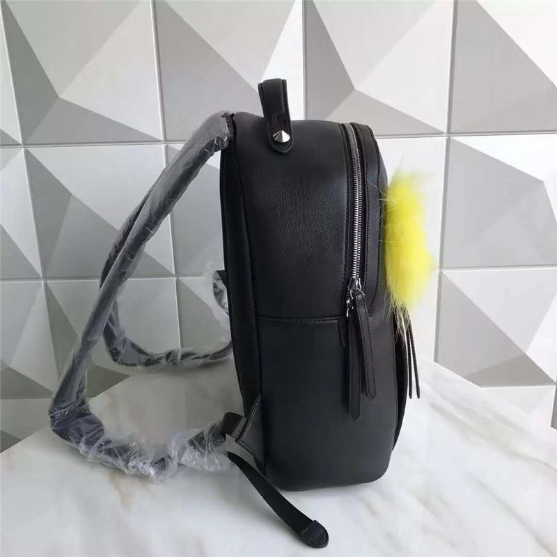 FENDI/芬迪 走秀新款 小怪獸黃毛毛大眼睛鉚釘 雙肩包 黑色